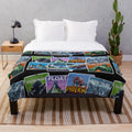 Universal Islands of Adventure-inspired plush blanket featuring a collage of iconic attractions