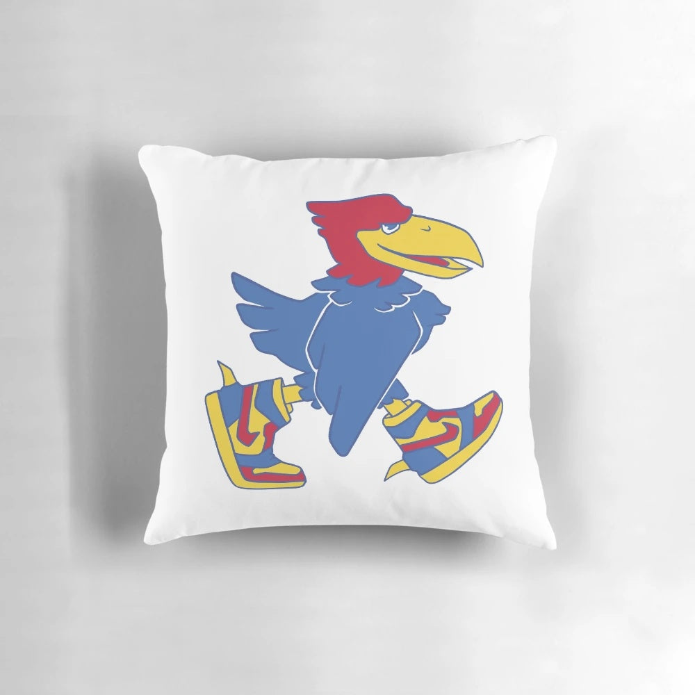 A Jayhawk wearing Jordan sneakers printed on a white pillow