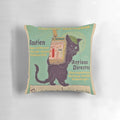 An art nouveau-style cat pillow with a revolutionary message of leftist and anarchist ideals.