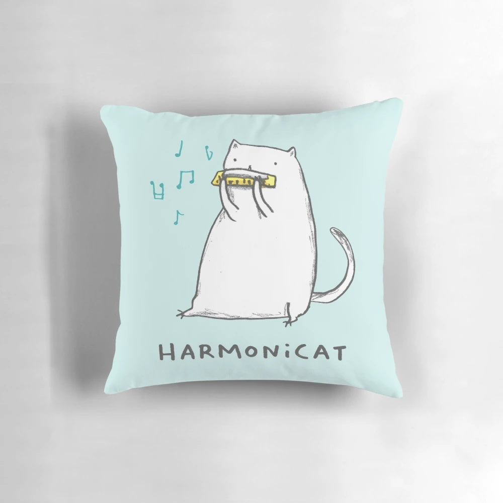 Harmonicat Pillow featuring a cute cat playing a harmonica, perfect for music lovers and pet owners