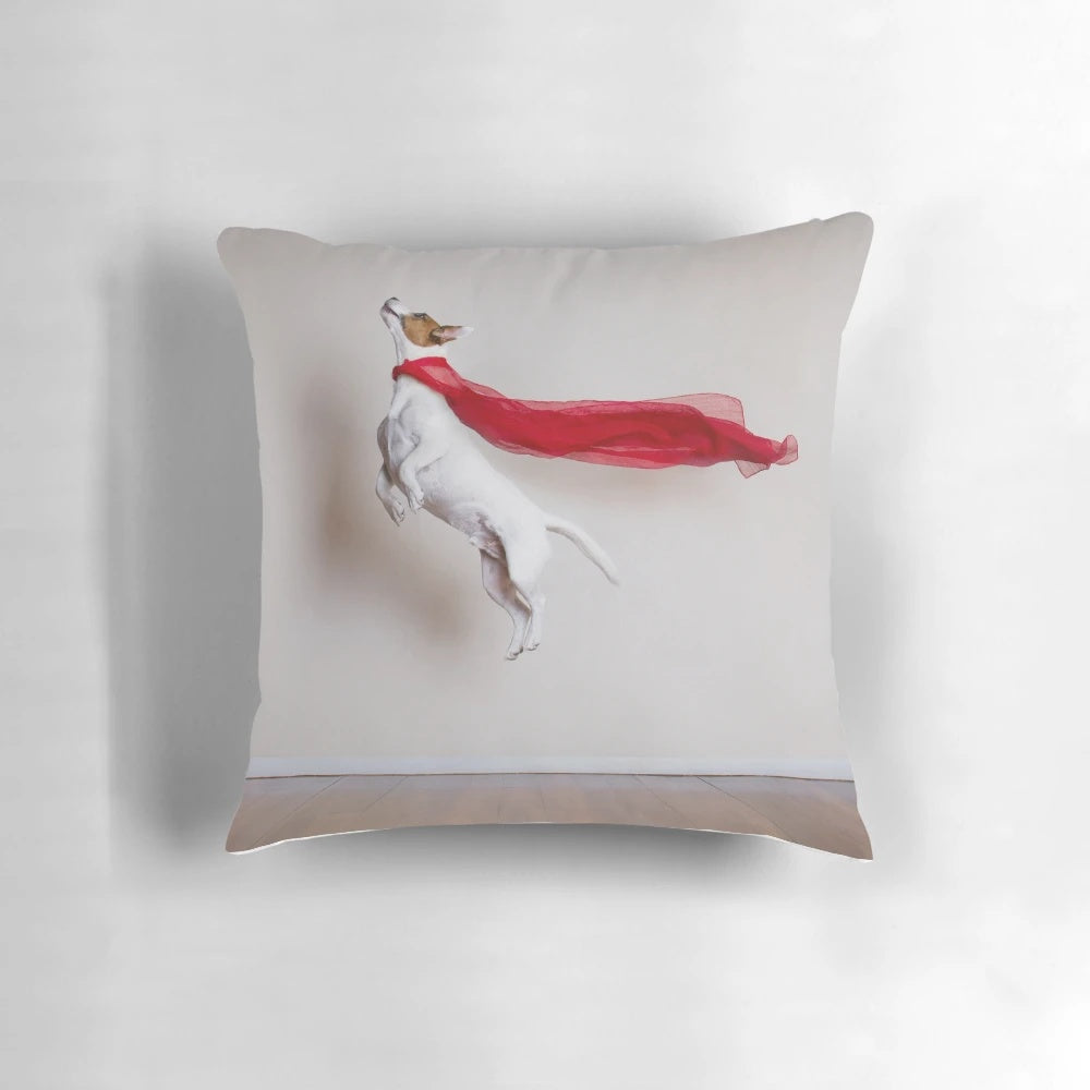Whimsical image of a dog wearing a superhero cape, resting on a soft pillow