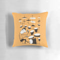 A vibrant and playful pillow featuring a graphic design of drums and the phrase "Play That Beat