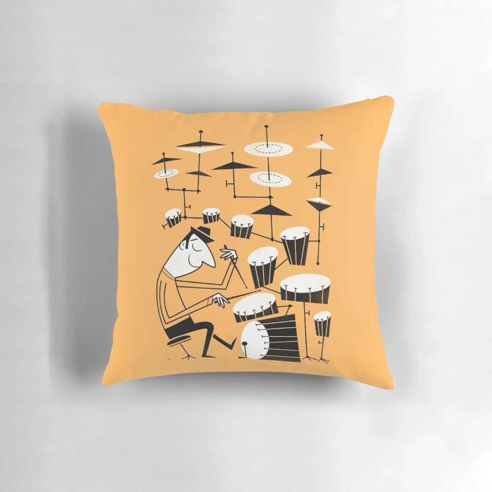 A vibrant and playful pillow featuring a graphic design of drums and the phrase "Play That Beat