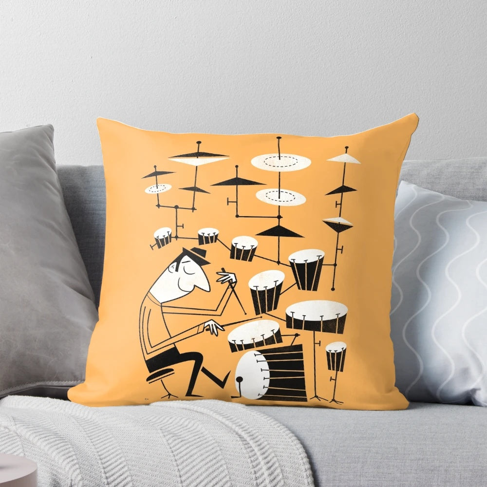 A vibrant and playful pillow featuring a graphic design of drums and the phrase "Play That Beat
