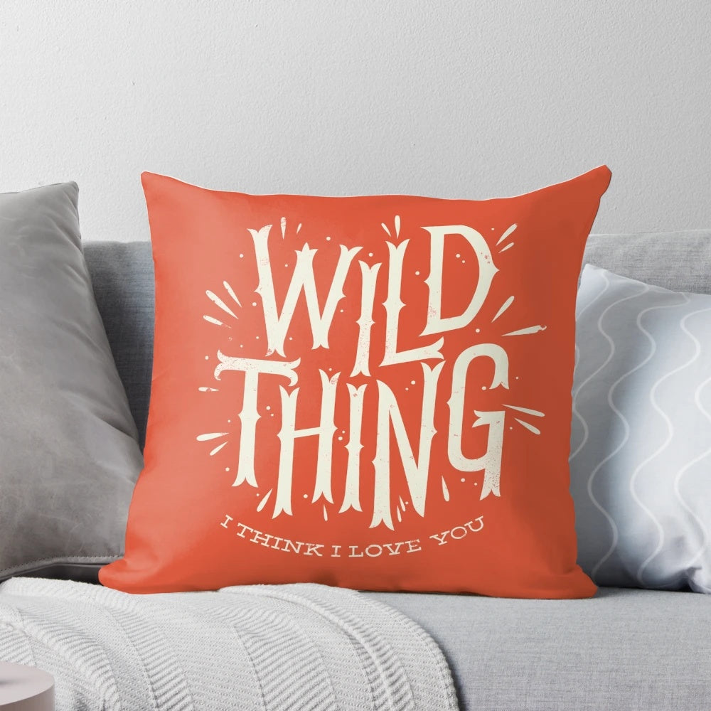 A vibrant, nature-inspired Wild Thing Pillow with a bold, typographic design