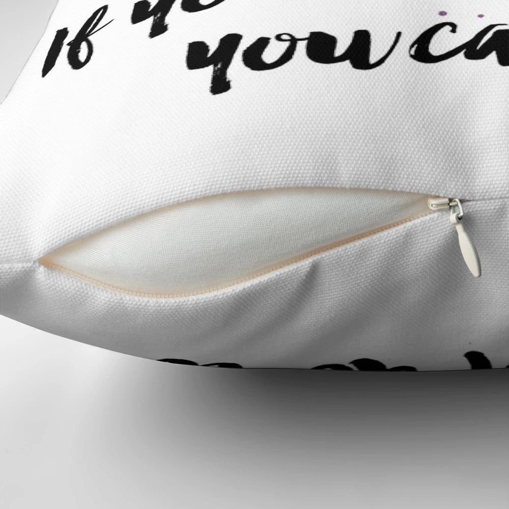 A plush, Disney-themed pillow with the inspirational quote "If you can dream it, you can do it"