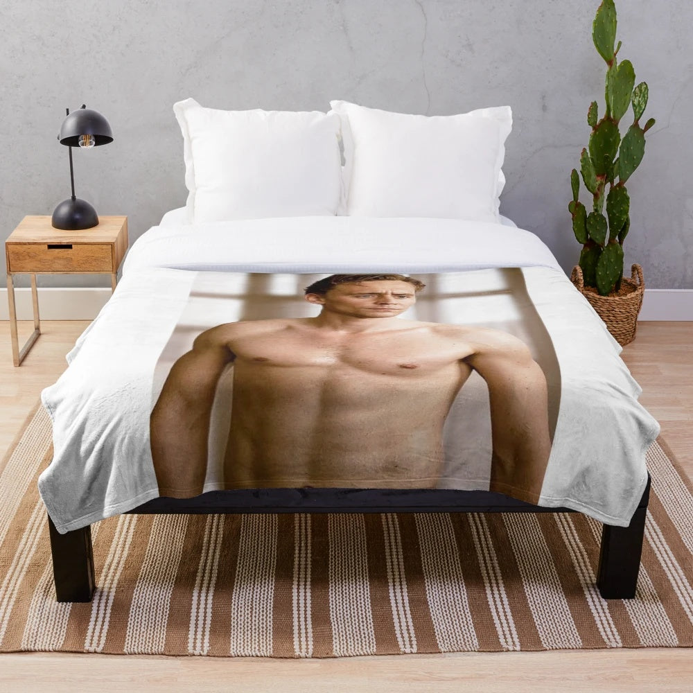 Plush blanket featuring a shirtless image of actor Tom Hiddleston as the Marvel character Loki