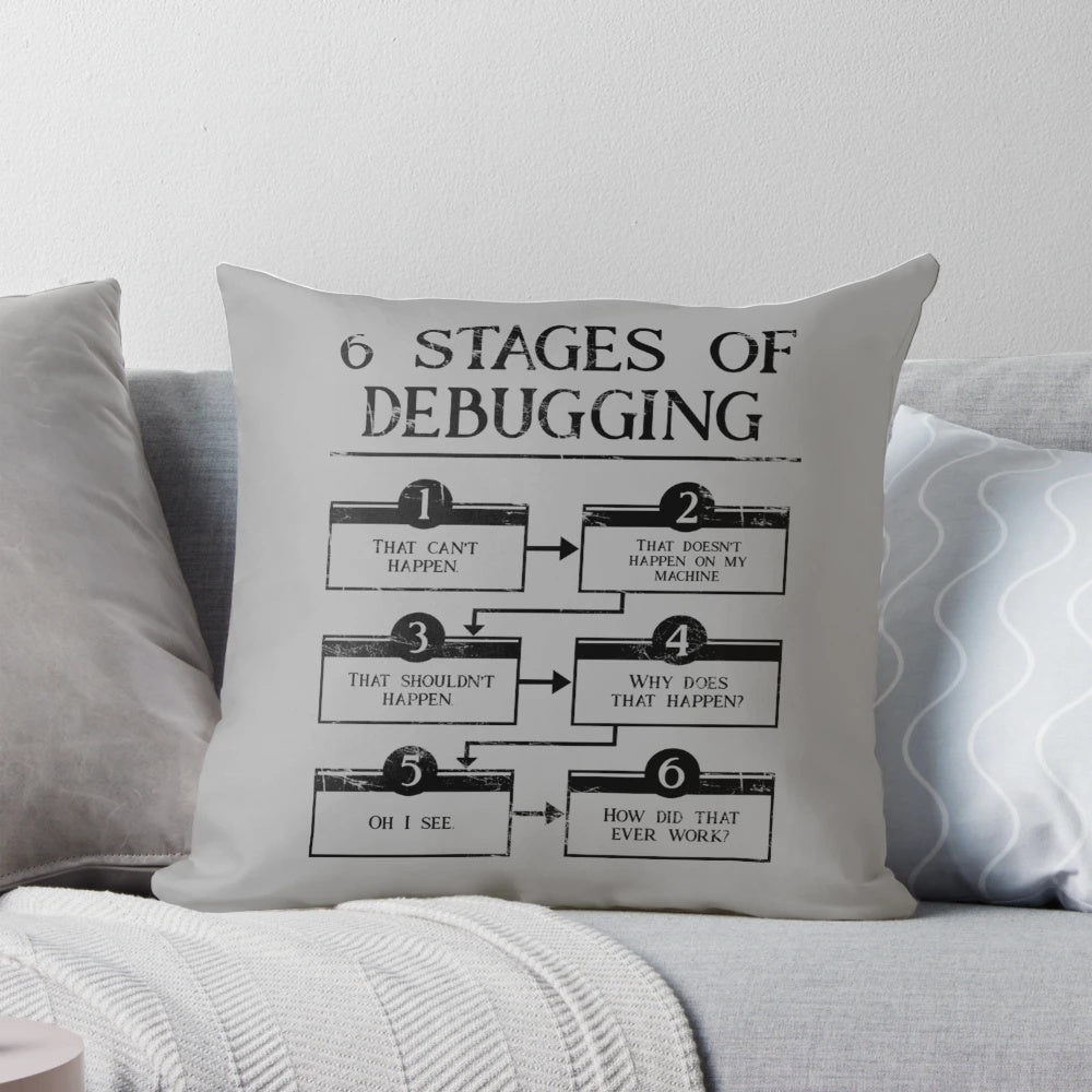 Pillow depicting the 6 stages of debugging in computer programming