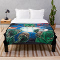 Unsettling plush blanket featuring heavy metal inspired artwork