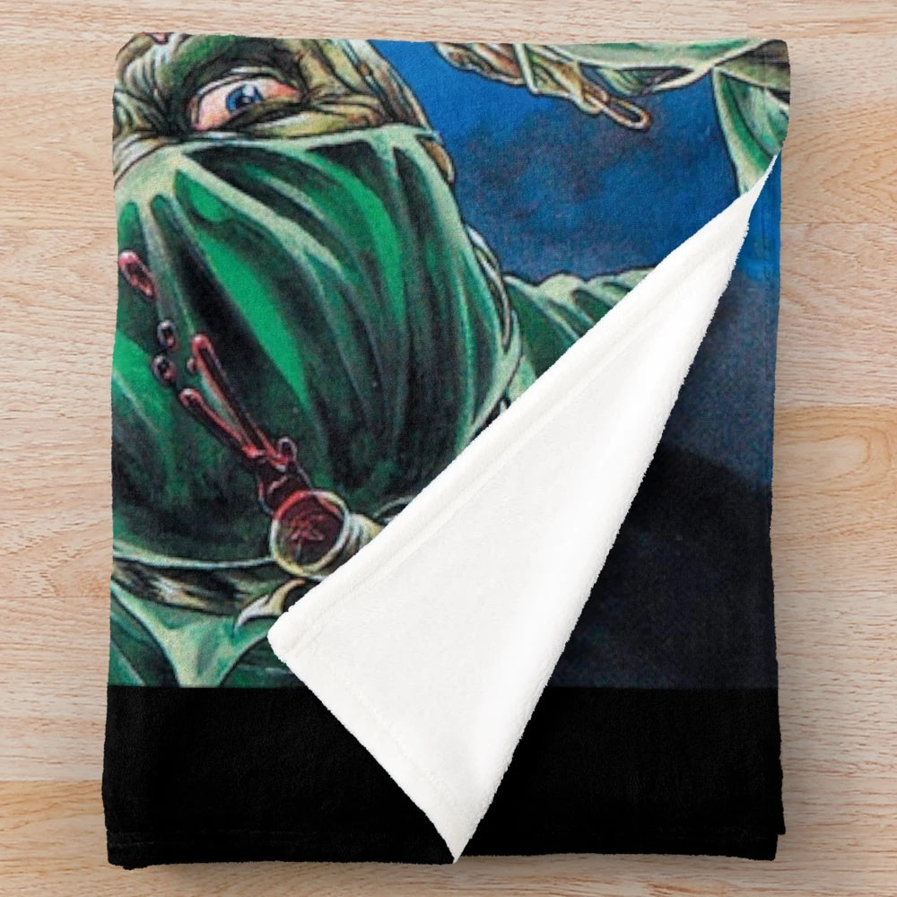 Unsettling plush blanket featuring heavy metal inspired artwork