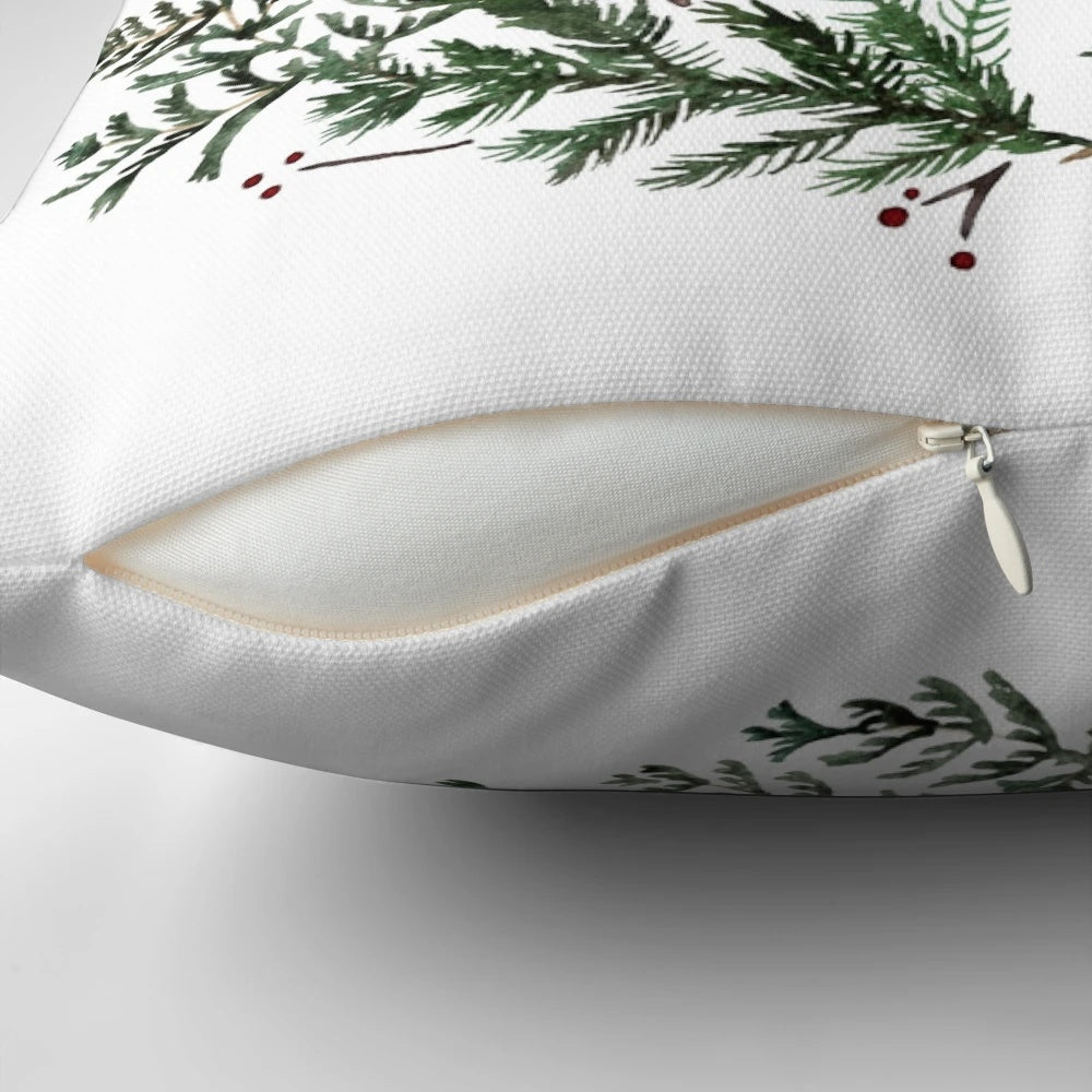 Pine wreath pillow with "Unto Us a Child is Born" bible verse text