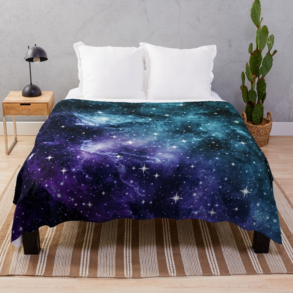 Teal and purple galaxy nebula plush blanket with stars and cosmic design