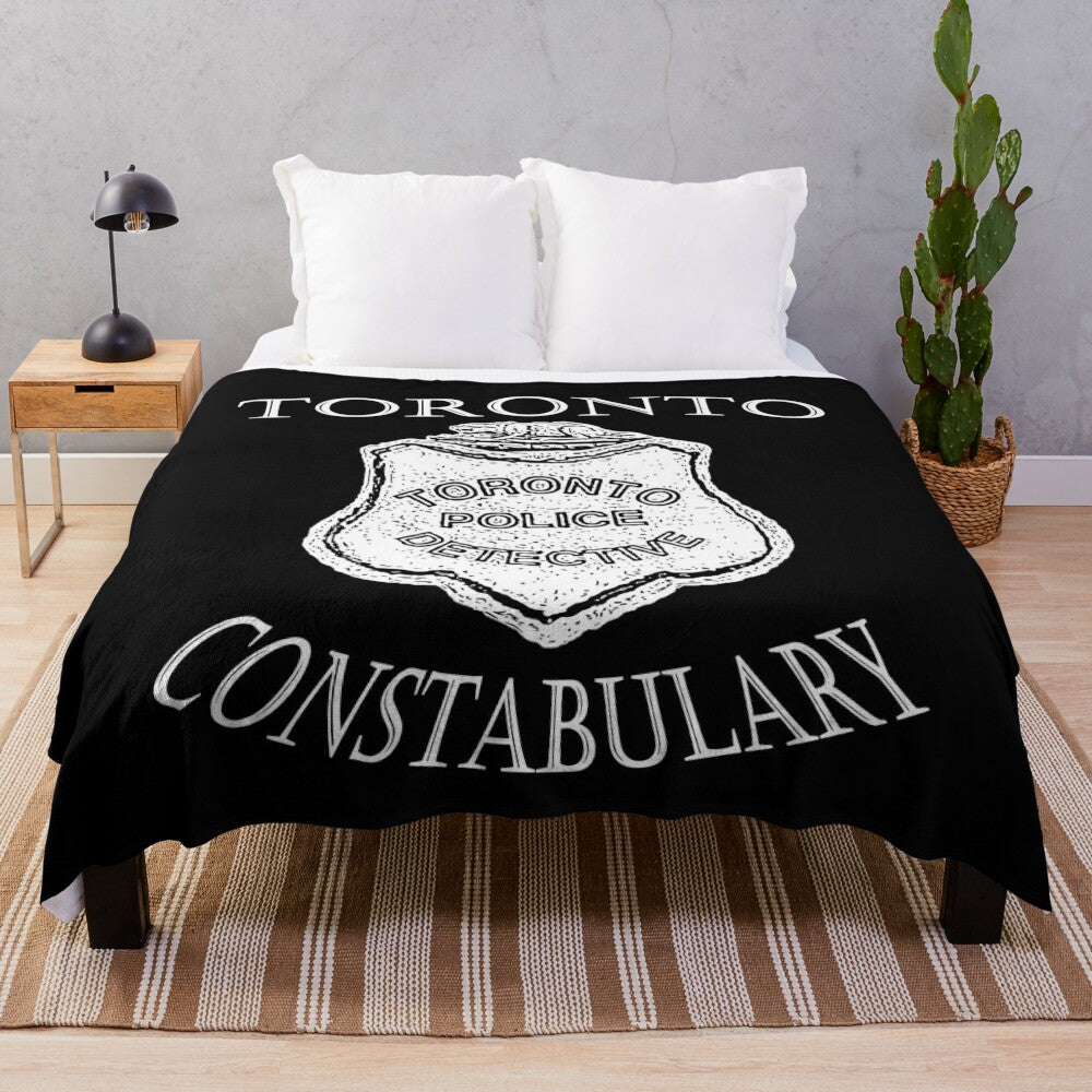 Vintage-inspired plush blanket featuring elements from the Canadian TV series Murdoch Mysteries