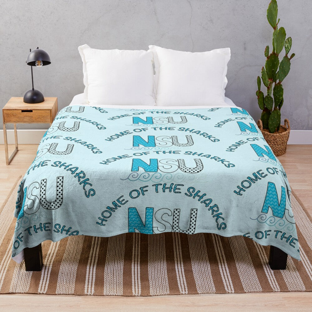 NSU-inspired plush blanket featuring waves, sharks, and polka dots