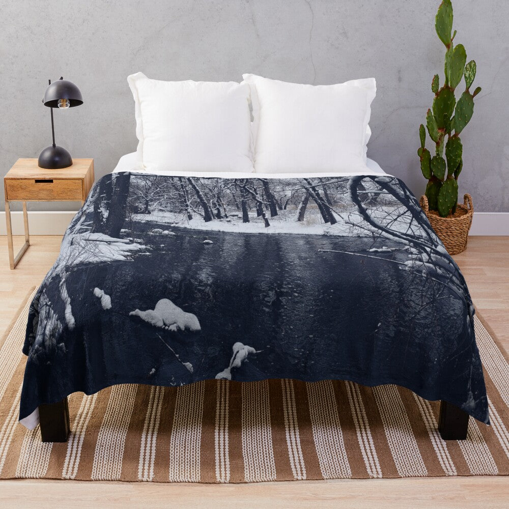 Plush blanket with dark, gothic landscape design