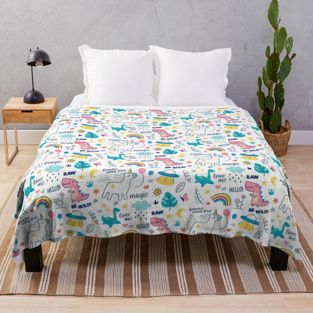 Colorful hand-drawn dinosaur and unicorn pattern plush blanket