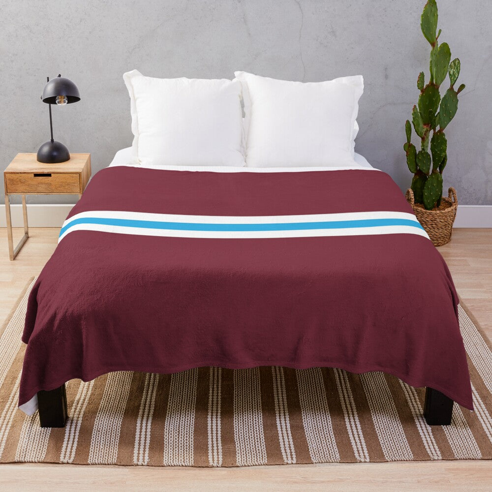 Soft and warm plush blanket featuring the claret and blue colors of West Ham United football club