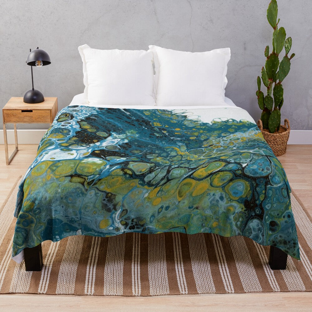 Teal plush blanket with abstract wave pattern