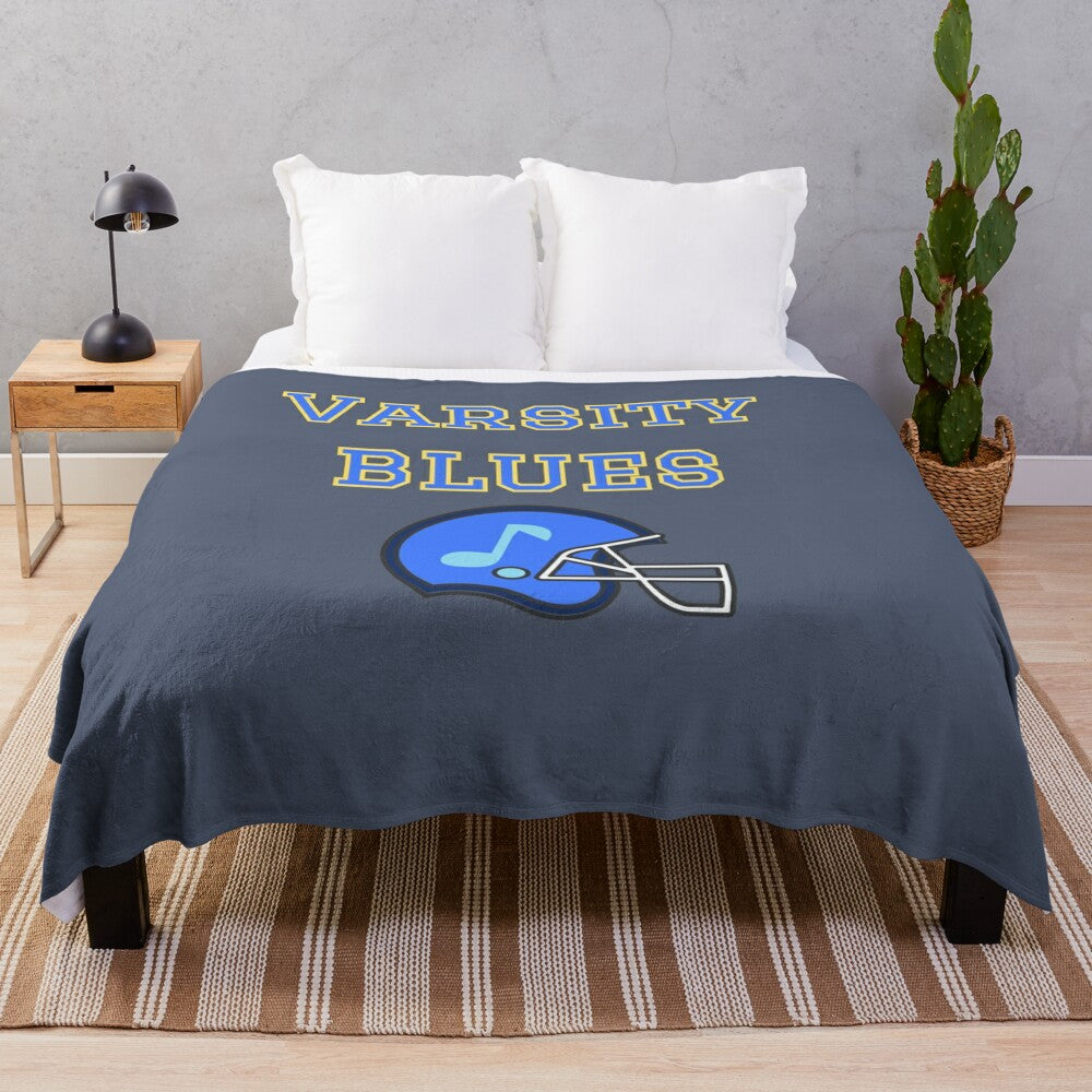 Plush blanket with varsity football and retro 90s design