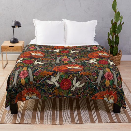 Plush blanket with a nature-inspired fox and floral pattern design