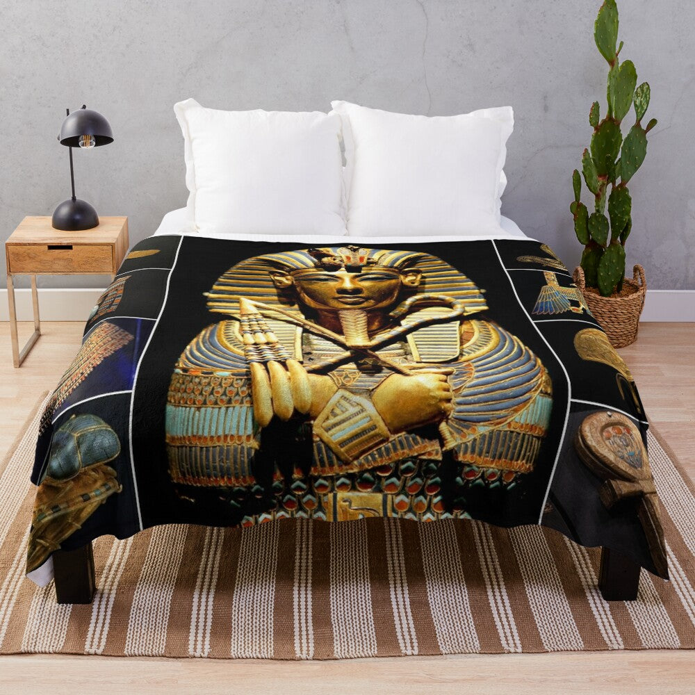 Plush blanket featuring Tutankhamun artifacts and ancient Egyptian design