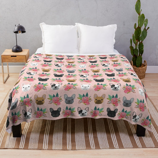 Plush blanket featuring a pink floral pattern and adorable French Bulldog faces