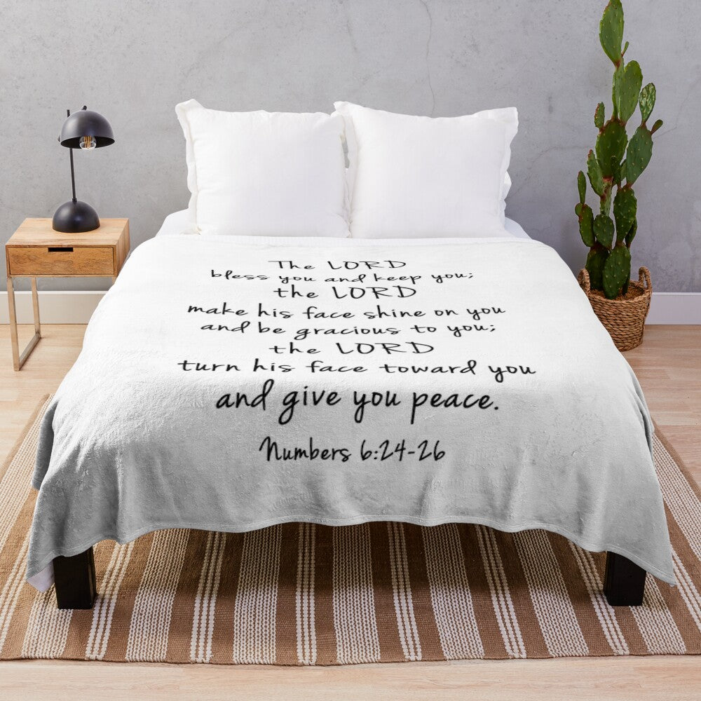 Plush blanket with the bible verse "The Lord bless you and keep you"