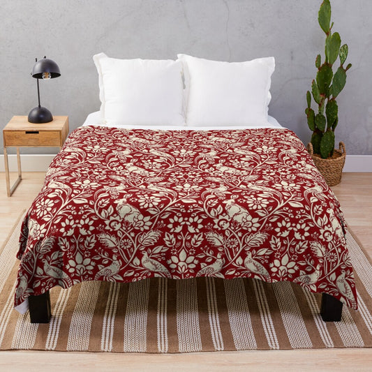 Plush blanket with a vintage-inspired pheasant and hare pattern in deep red and cream colors