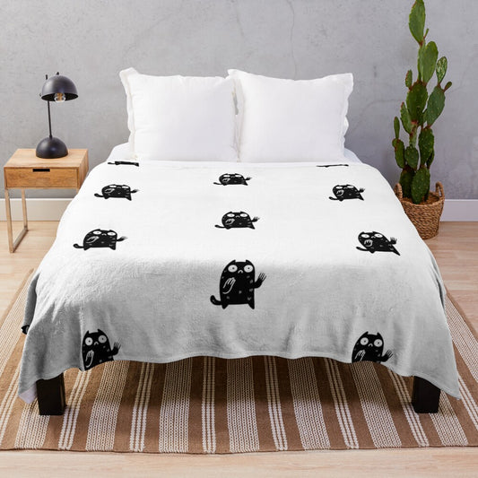 Black cat plush blanket with cartoon cat design