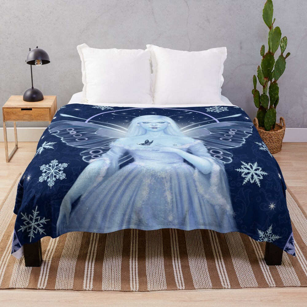 Soft, plush blanket featuring a whimsical snow fairy design with glittering snowflakes and stars