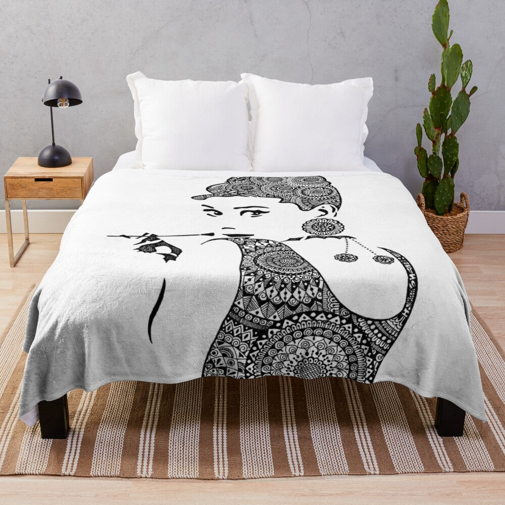 Soft plush blanket featuring a beautiful mandala-style portrait of iconic actress Audrey Hepburn