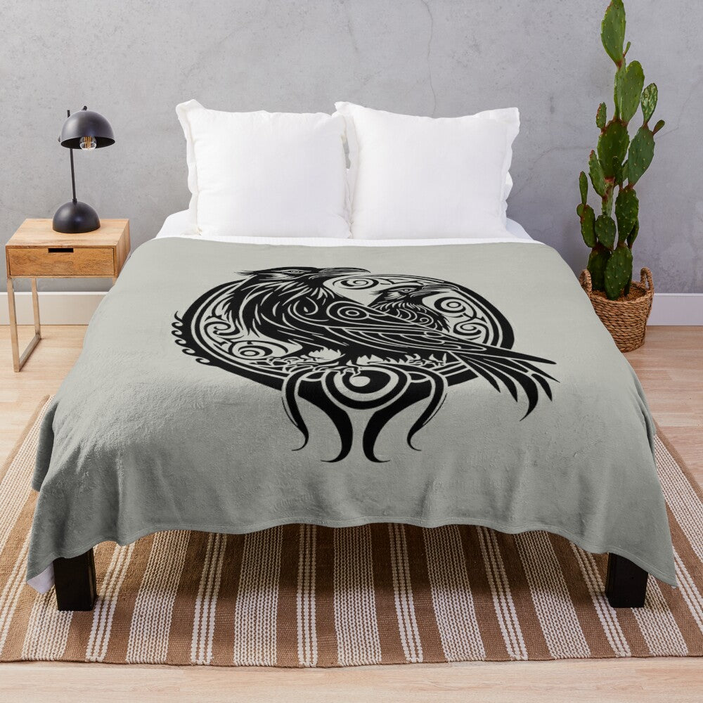 Raven silhouette plush blanket with tribal elements and legendary animal design