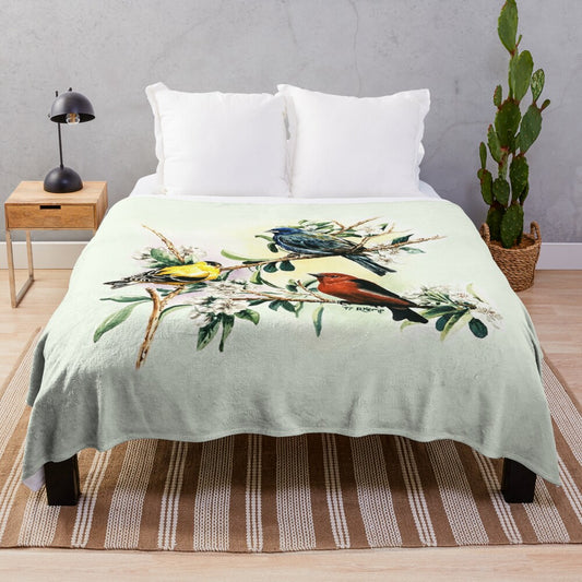 Plush blanket featuring watercolor illustrations of songbirds - goldfinch, indigo bunting, and scarlet tanager