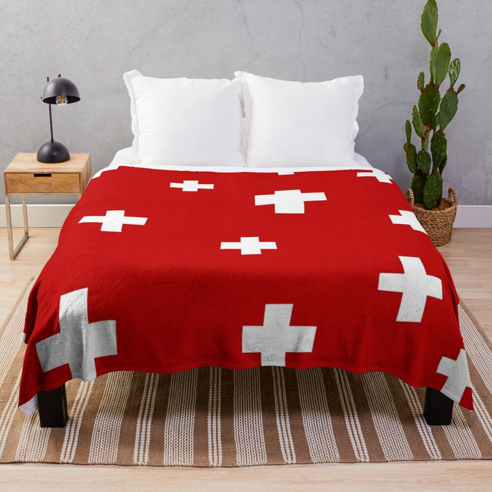 Swiss-inspired plush blanket with minimalist geometric design