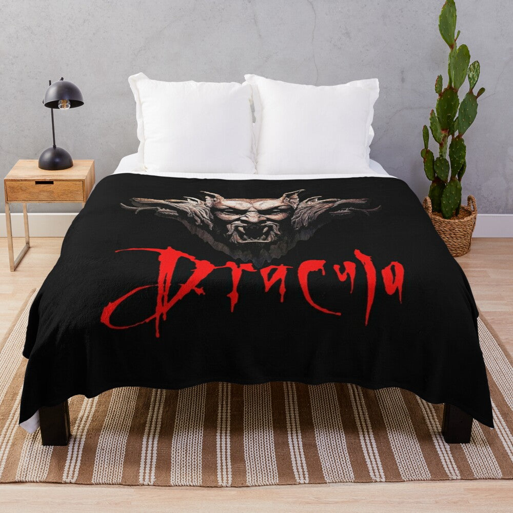 Vintage-style plush blanket featuring Dracula movie imagery