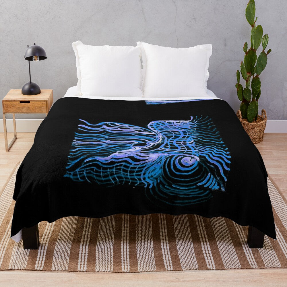 Plush blanket with underwater-inspired design for cozy relaxation