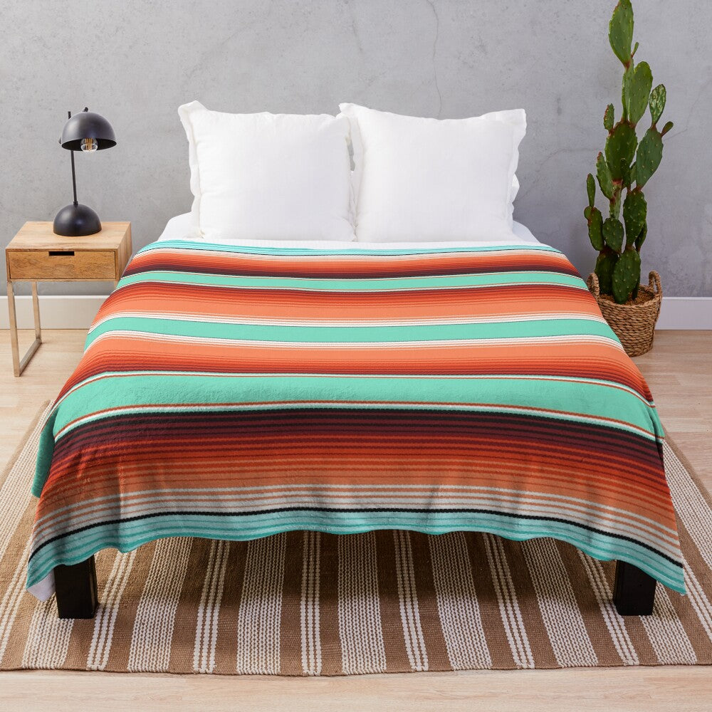 Teal, turquoise and burnt orange southwest inspired plush blanket with serape stripes