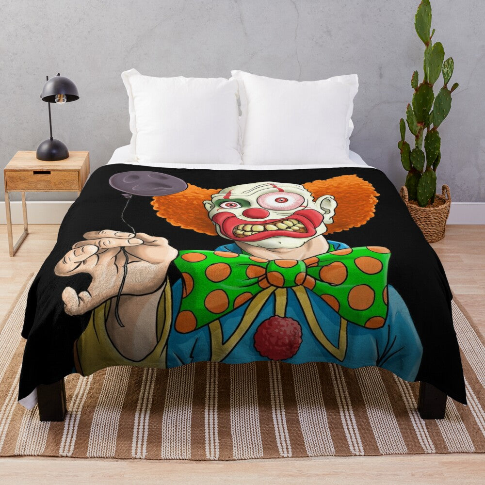 Plush blanket featuring an evil clown design