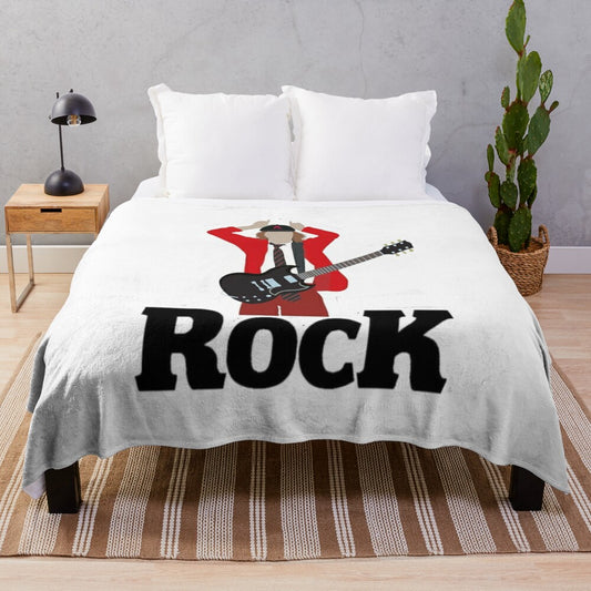 ACDC-inspired plush blanket with band logo and imagery