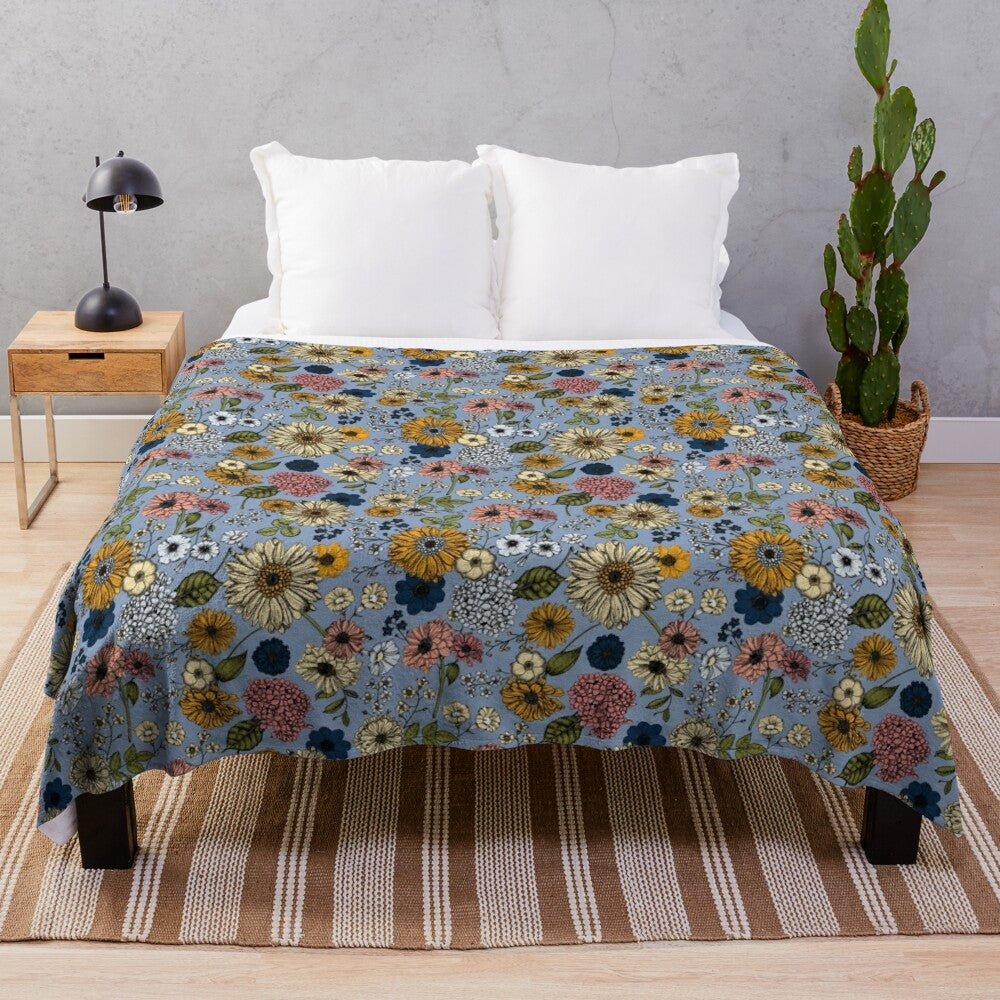 Colorful floral plush blanket with daisy and wildflower design