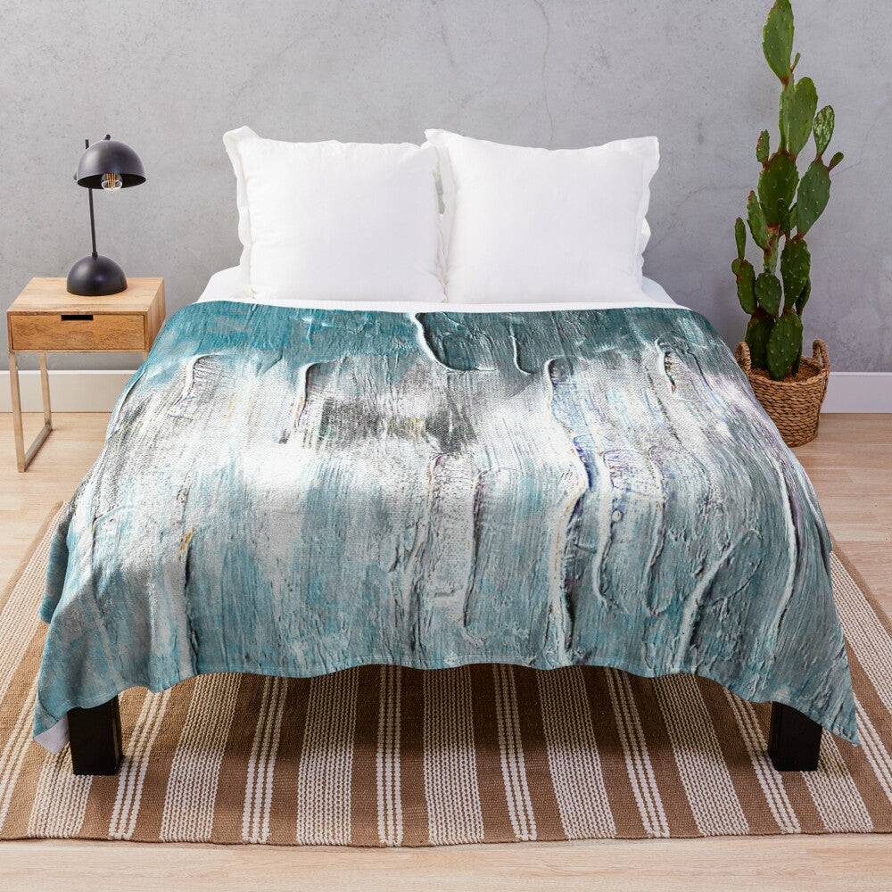 Abstract plush blanket with ocean teal and blue waves design