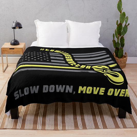 Tow truck operator plush blanket with "Slow Down Move Over" message