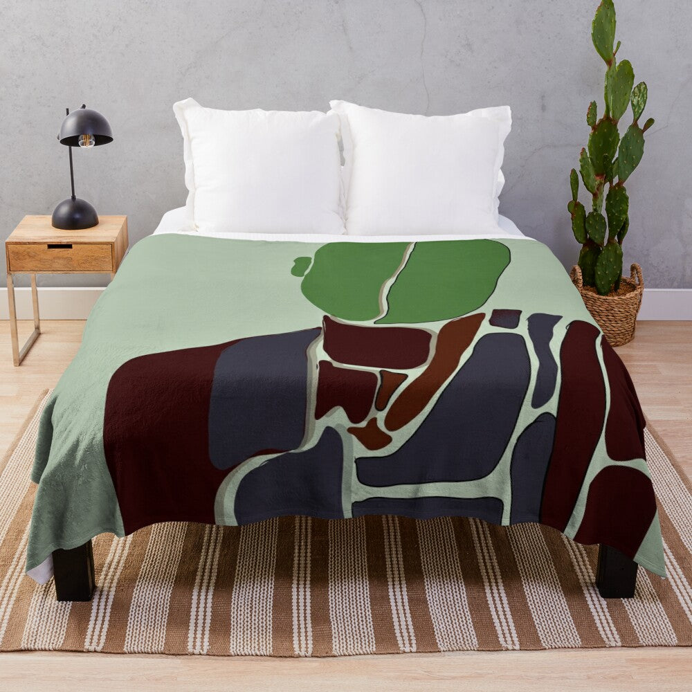 Abstract art-inspired plush blanket with soft, neutral colors and minimalist design