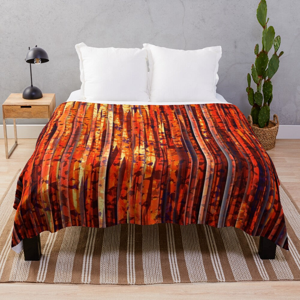 Contemporary abstract striped plush blanket with bold orange, yellow, and red colors