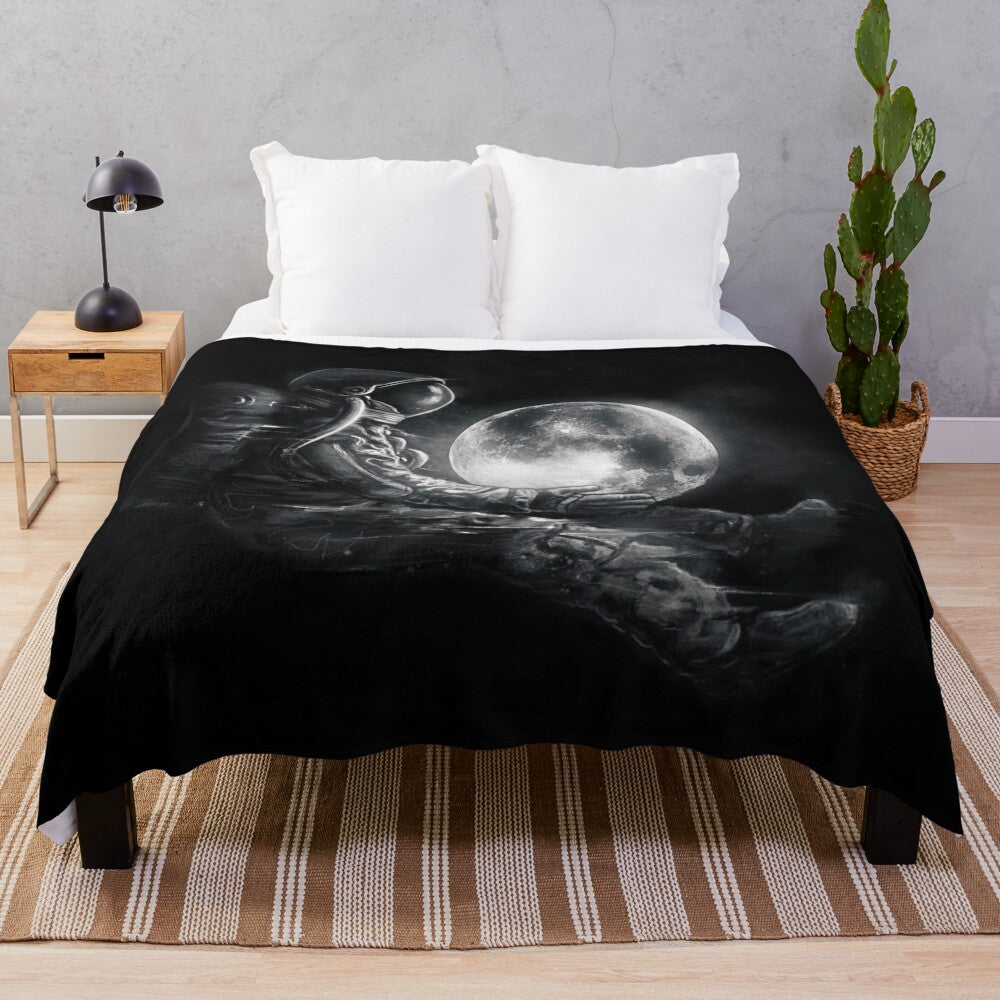 Plush blanket with cosmic moon and space design