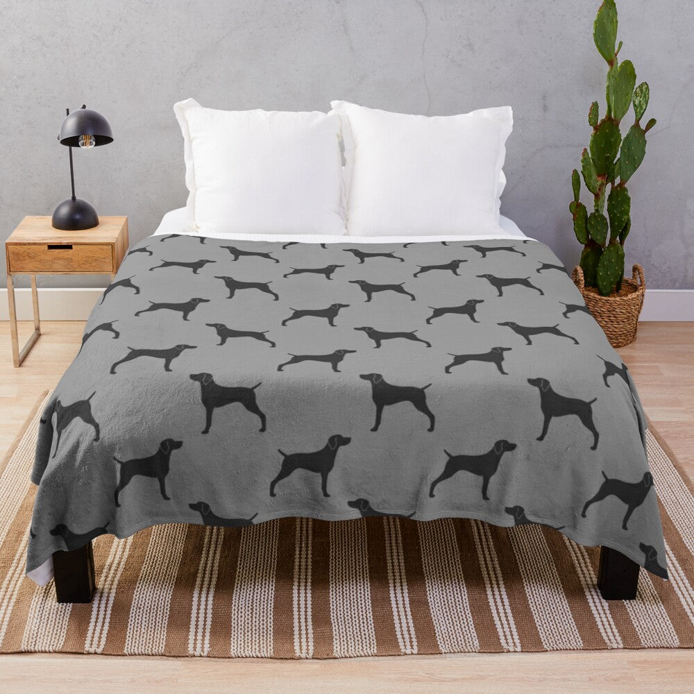 Weimaraner dog breed silhouette design on a plush blanket