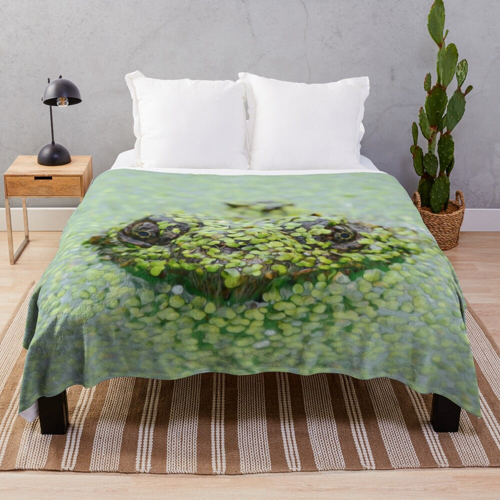 Plush blanket with detailed illustrations of exotic reptiles, amphibians, and plants in a swamp or marsh habitat