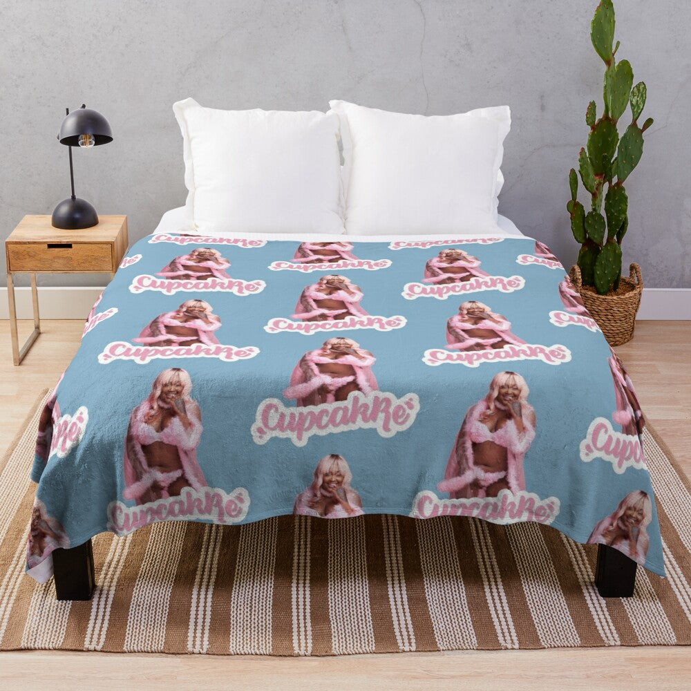 Colorful plush blanket featuring cupcakke's name and design