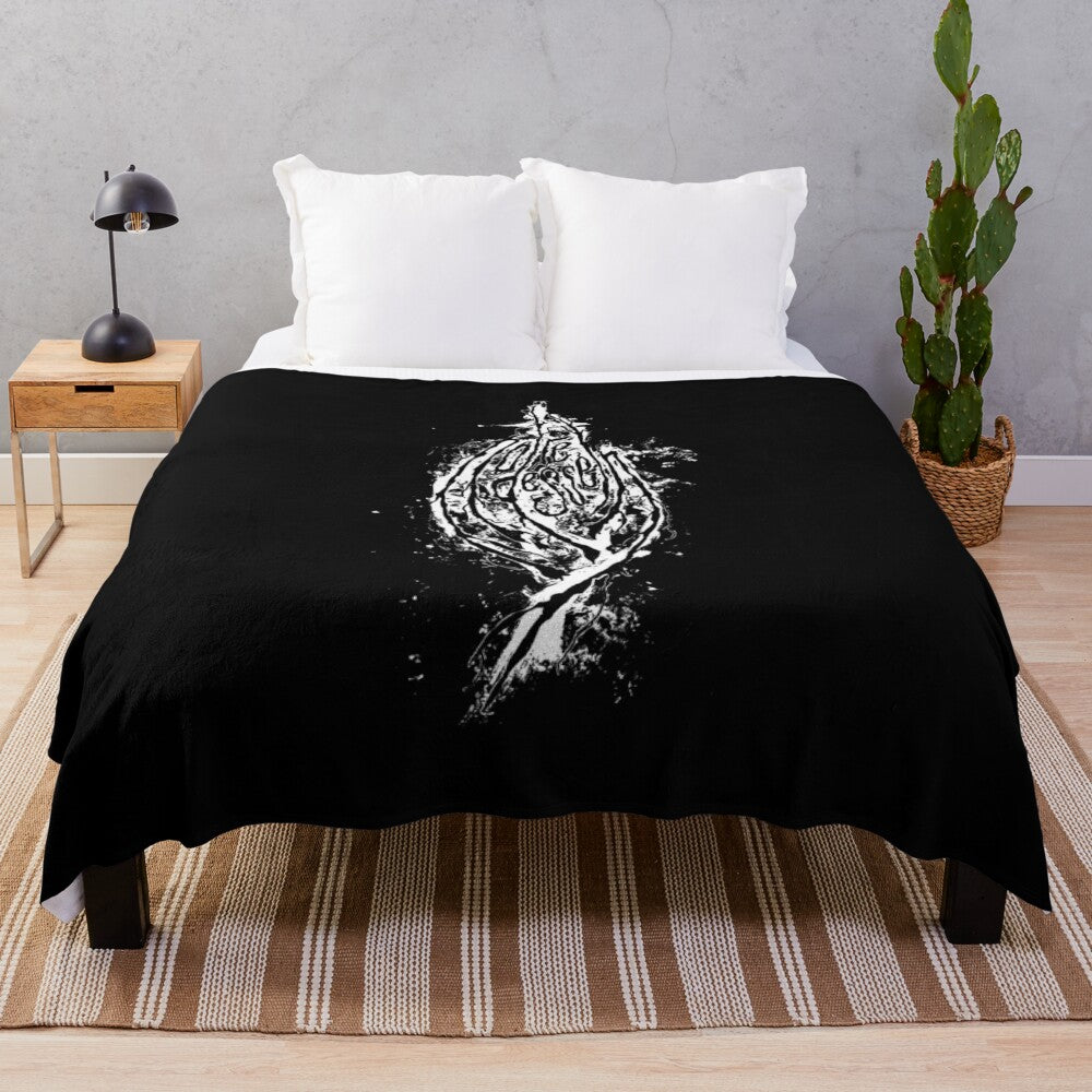 Plush black and white blanket with occult and metal music-inspired design