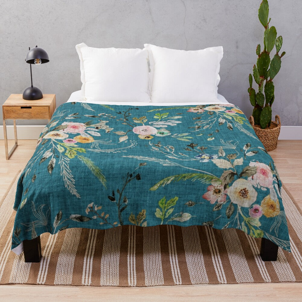 Teal floral plush blanket with romantic, bohemian-inspired design